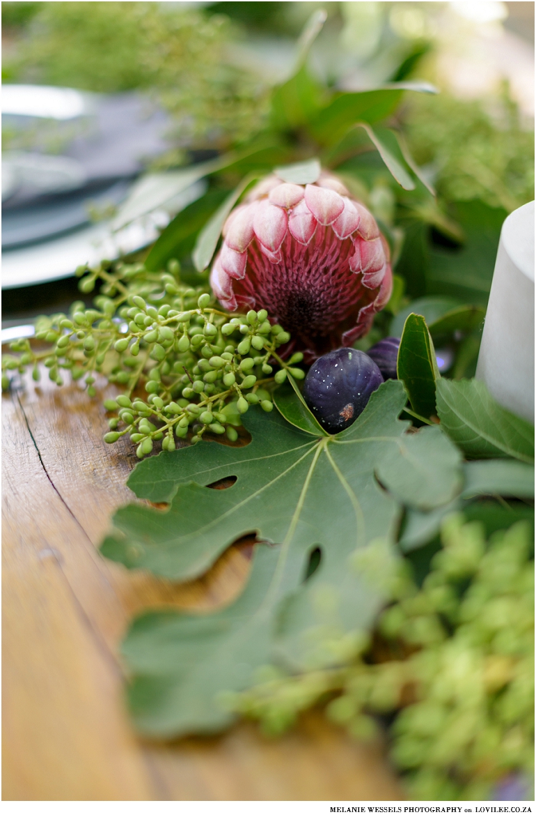 Easter table decorations with figs and proteas