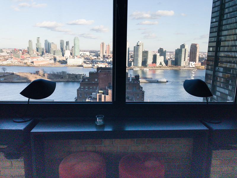 View of Long Island City and chic interior