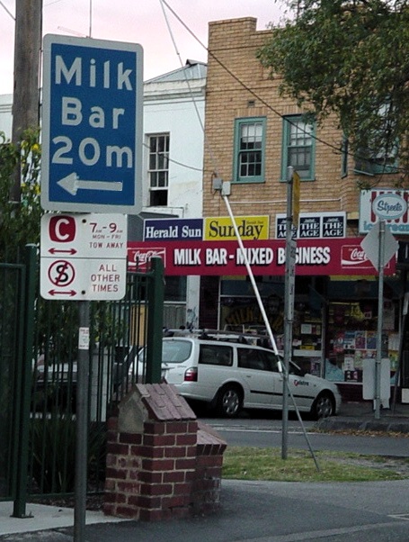 Milkbar, with sign strangely pointing to other milkbar