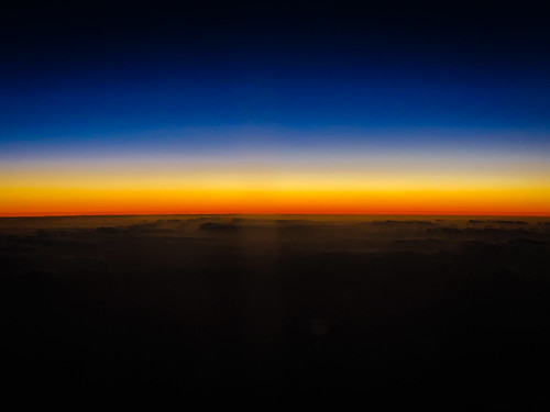 puntacana laaltagracia dominicanrepublic do aerial view sunset over atlantic ocean sun yellow orange blue earth horizan cloud clouds sky