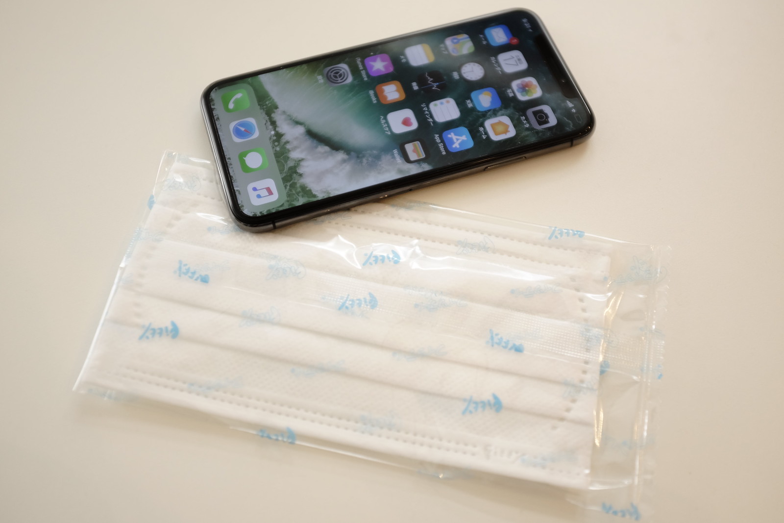 iPhone X with surgical mask