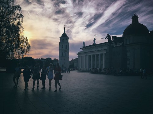 people girls evening vilnius cathedral sunset travel city