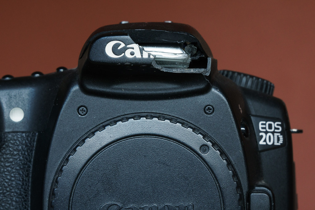 The broken flash housing on my Canon EOS 20D digital SLR