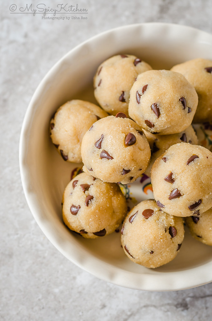A blow of gluten free edible chocolate chip cookie dough balls; a dessert and a sweet snack