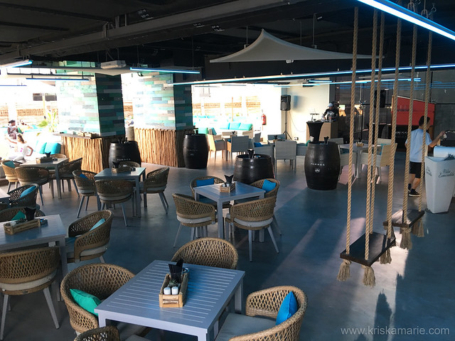 Indoor seating at L!QD at Tryp by Wyndham