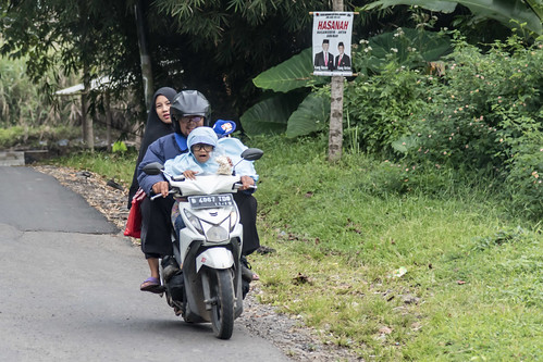 indonesia motorcycle people family hijab helmet