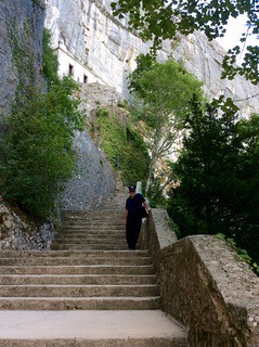 Bob on final stairs to grotto. From Author Shares Travel and Historical Research for Her New Novel, Discovery