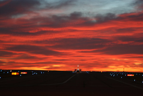 red sky orange weather clouds sunrise catchycolors dawn flying airport colorado aviation coloradosprings runway cos taxiway kcos