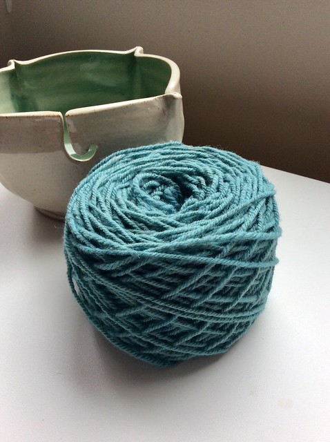 Handspun Romeldale/CVM wool wound into yarn cake dyed Saxon blue