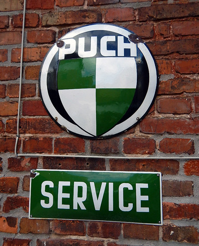 Garage service sign in Den Gamle By, a recreated old village in Aarhus, Denmark