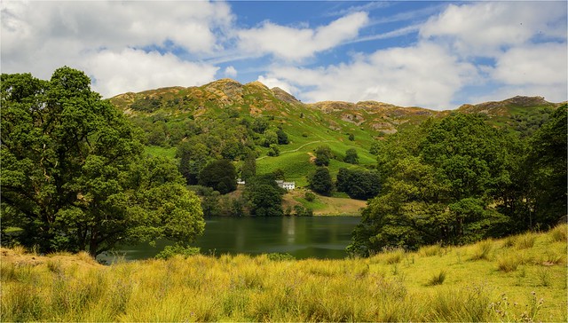 Loughrigg Tarn Lake in England Loughrigg Tarn is a small, natural lake in the Lake District, Cumbria, England. It is situated north of Windermere, just north of the village of Skelwith Bridge, and at the foot of Loughrigg Fell. Wikipe