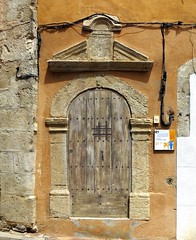 A doorway with a speakeasy window and iron grill, Tavernes, Var, Provence - Photo of Varages