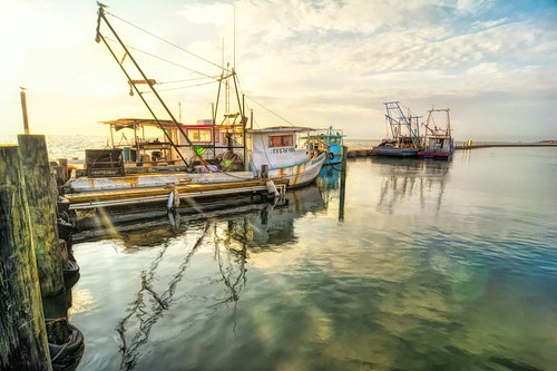 texas fultonharbor water dawn sunrise pier oysterboat commercialfisherman reflection southernstyle south fishing sky