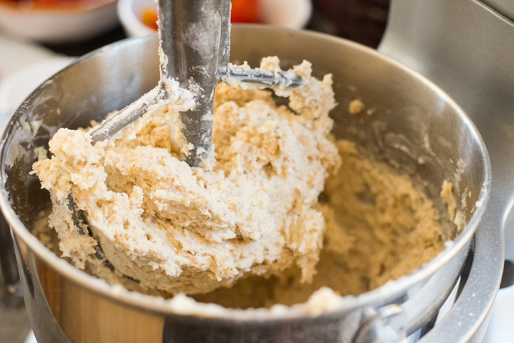 Add flour and finely ground almonds to your Italian wedding cookies recipe.