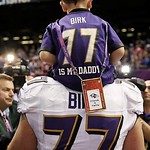 Super Bowl Champion Matt Birk and son - Super Bowl XLVII, New Orleans, Louisiana