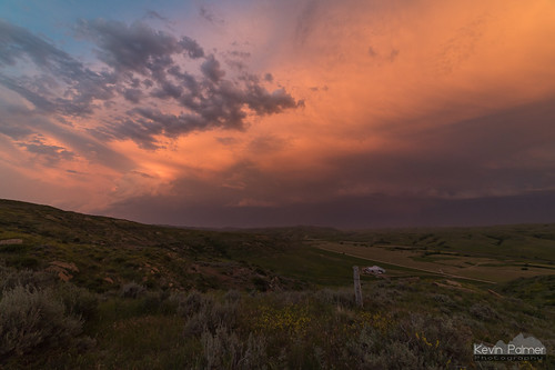 summer july wyoming nikond750 samyang rokinon14mmf28 wyarno clouds storm thunderstorm stormy weather sky hills evening sunset colorful orange pink red green grass scenic view post sagebrush