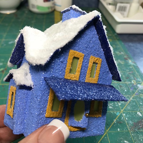Blue Putz with snow covered roof