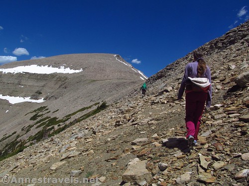 Walking the last scree slope into the saddle below Mt. Agassiz (straight ahead), High Uinta Mountains, Utah