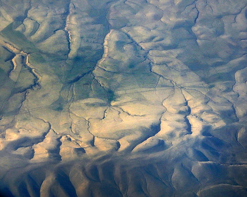 Aerial shot of a desert looking much like a Georgia O'Keeffe painting