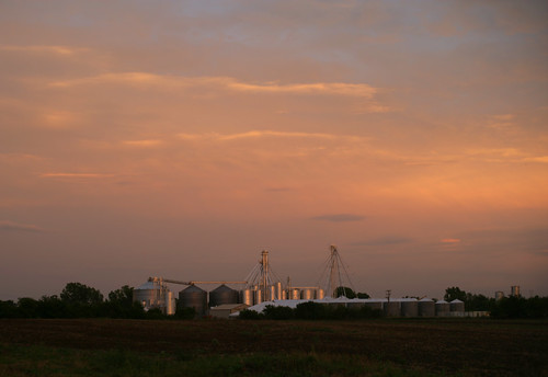 sunset clouds landscape farm farming grain storage silo kansas chanute agroculture