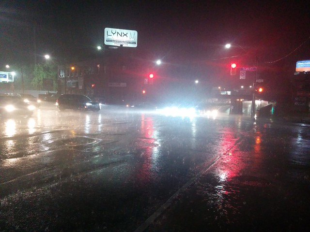Rain dancing off pavement, Dufferin and Dupont #toronto #rain #dlws #night #dovercourtvillage #dufferinstreet #dupontstreet