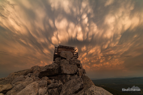 bighornmountains bighornnationalforest wyoming summer august nikond750 smoky samyang rokinon14mmf28 blackmountain top summit stormy storm thunderstorm evening clouds sunset colorful color orange mammatus firelookouttower rocks boulders scenic view old wooden structure