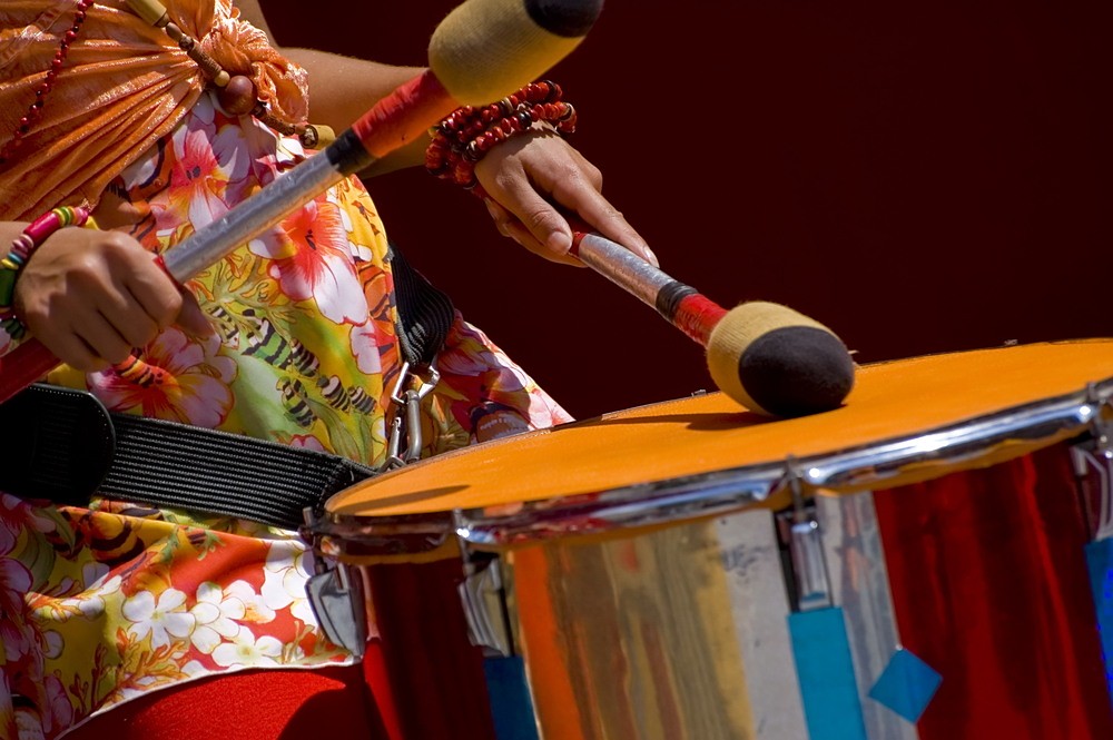colorful closeup of woman drumming