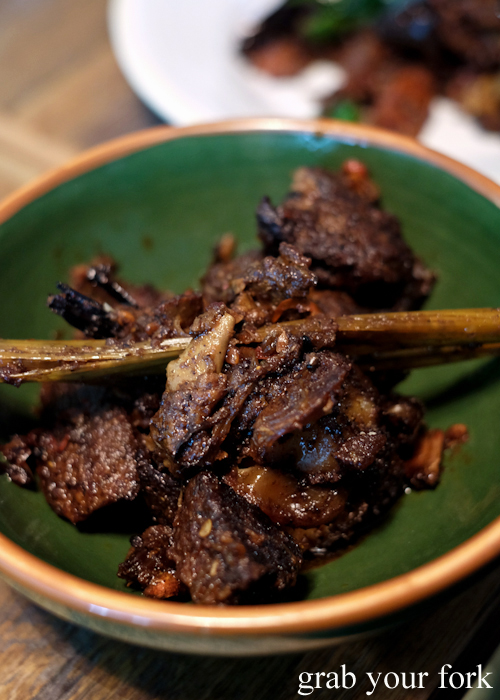 Goat in a black and dry curry by O Tama Carey at Lankan Filling Station in East Sydney