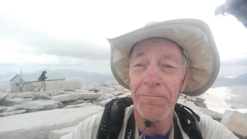 I took a selfie on the summit of Mount Whitney with the summit hut in the background for proof
