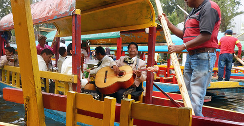 Mariachis playing at Xochimilco, the UNESCO Heritage Site of the former floating gardens in Mexico City