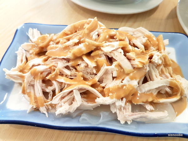  Peanut butter sauce on top of shredded chicken and transparent noodles