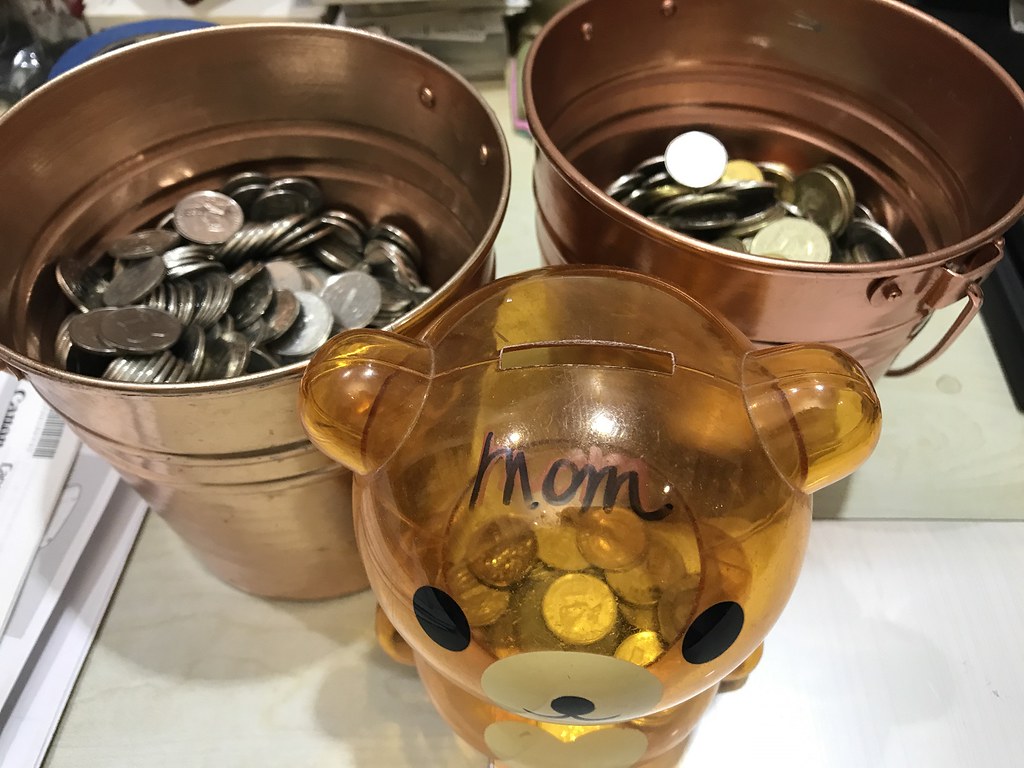 Two pails of coins
