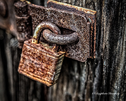 augphotoimagery decay lock old padlock rust rusty texture weathered newberry southcarolina unitedstates