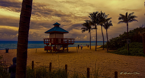 lateafternoon beachscape beachshore sunset sunnyislesbeach urbanexploration coconuttree people lifeguardhouse outdoors colors clouds seashore seascape