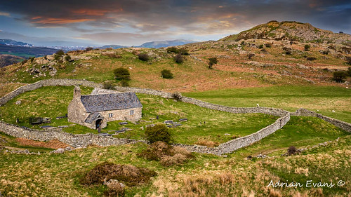 spring snowdonia historic church walledgarden stcelynninchurch monument hill celynnin religious tomb uk cemetary british roof architecture llangelynnin stone path churchyard landscape sunset old landmark buildings outdoor clouds religion wales christian catholic adrianevans sky graveyard heritage graves northwales bell chapel cemetery