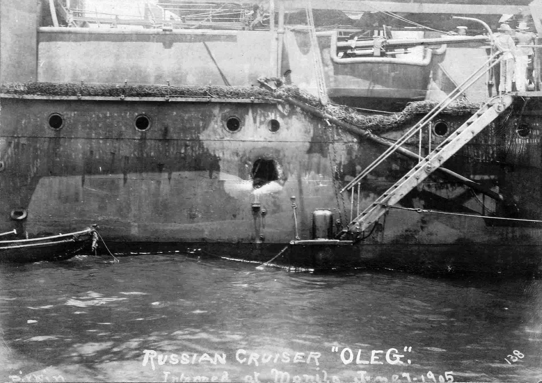 Russian protected cruiser Oleg, showing battle damage after the Battle of Tsushima. Photo taken on June 27, 1905 in Manila Bay, Philippines. Original sepia-tint photograph slightly digitally-enhanced and cleaned up. 