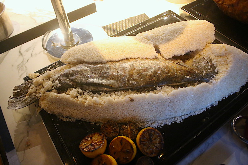 Salt crusted baked whole fish