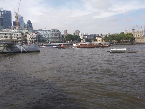 Barge on the River Thames carrying piping for the London supersewer project