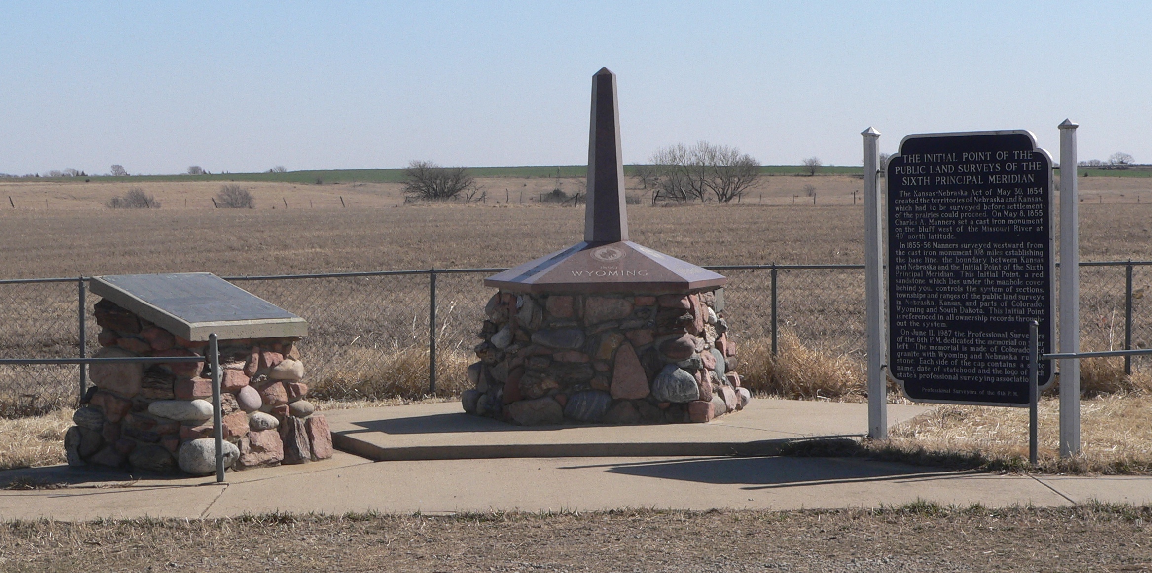  Survey monument JF00-072, located on Nebraska-Kansas state line at intersection of Nebraska counties Thayer and Jefferson and Kansas counties Washington and Republic; marking the intersection of 40 degrees north latitude and the Sixth Principal Meridian. Monuments and historical marker, seen from the west. Photo taken on March 9, 2012.