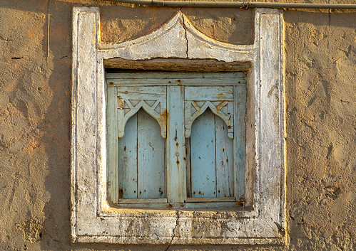 abandoned arabia arabianpeninsula arabic arabicarchitecture arabicstyle architecture buildingexterior carved carvedwindow carvingcraftproduct colorimage day decrepit dhofar dhufar exteriorview facade ghosttown gulfcountries habitation history horizontal house houseexterior mirbat moscha mudbrick nopeople old oldhouse oman oman18196 outdoors sultanate thepast traveldestination traveldestinations weathered window woodenwindow dhofargovernorate om