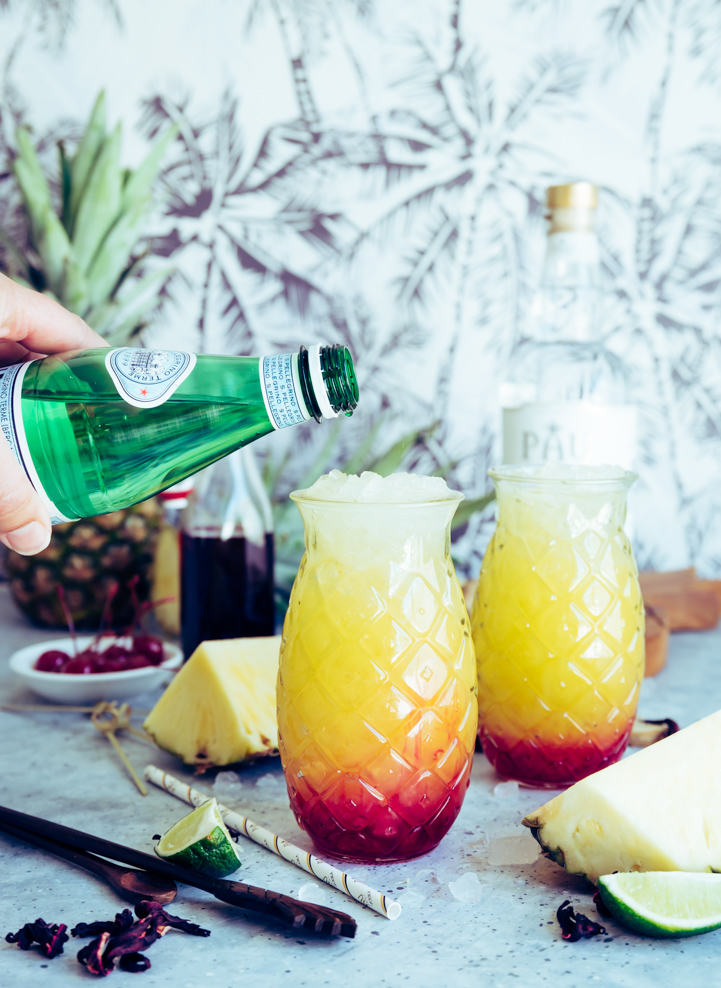 Maui Sunset Cocktail (Pineapple Hibiscus Vodka Cocktail) www.pineappleandcoconut.com #PAUMauiVodka #Earthday #sipresponsibly #noplastic #stopsucking #sipdontsuck #sponsored @paumauivodka