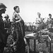 Basarabia, ROMÂNIA (iulie 1941). Militari români la slujba religioasă de înmormântare a camarazilor eroi căzuți în luptă pentru alungarea ocupanților bolșevici peste Nistru și eliberarea Basarabiei și Bucovinei.