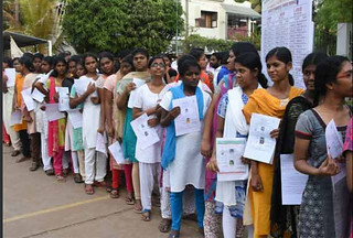 NEET Exam students standing in line