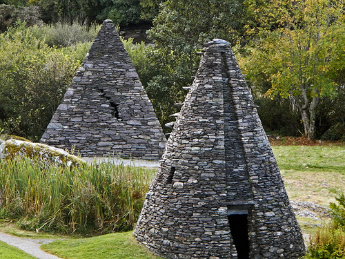 Stone sculpture in the garden that runs along the river in Sneem, Ireland
