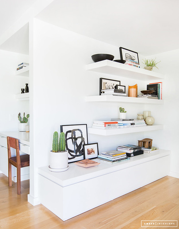 Neutral living book shelf by amber interiors