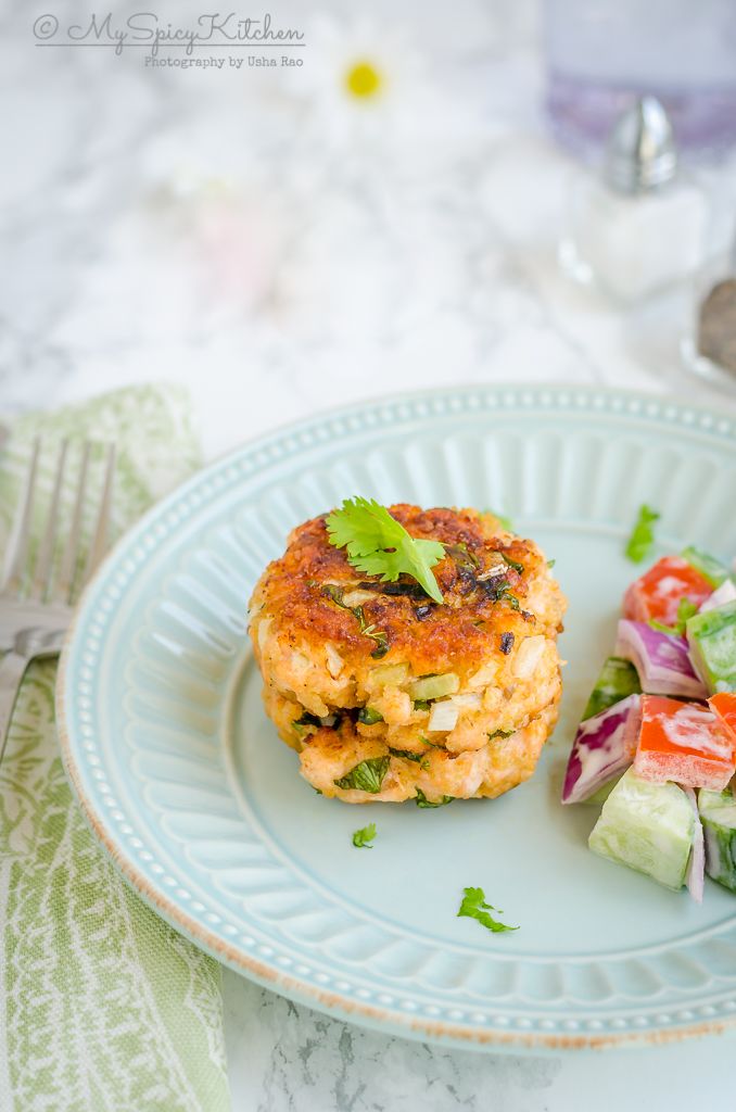 A stack of healthy pan grilled fresh fish cakes in a plate.