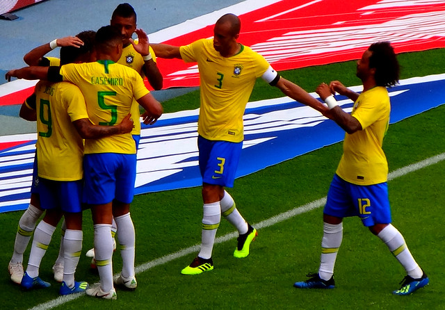 Brazil celebrate scoring against Austria