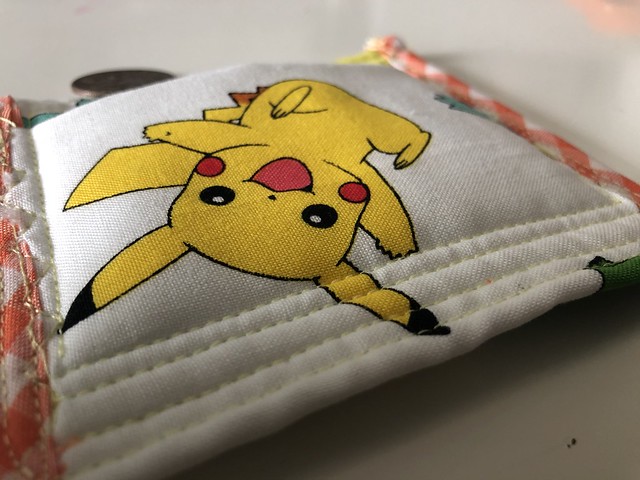Sewing a tooth fairy pillow with Pokémon fabric. This 20-minute project has high impact with bold fabric or bias tape. Read more on EvinOK.com