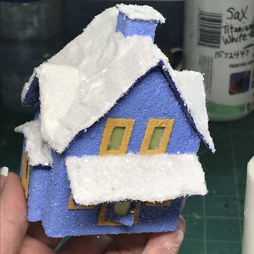 Blue Putz with snow covered roof