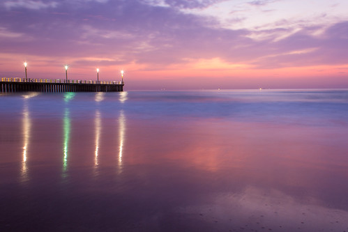 coast shore coastal water sea ocean clouds sky pier reflection longexposure lights